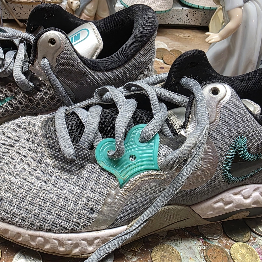 Nike Grey Athletic Sneakers with Teal Accent